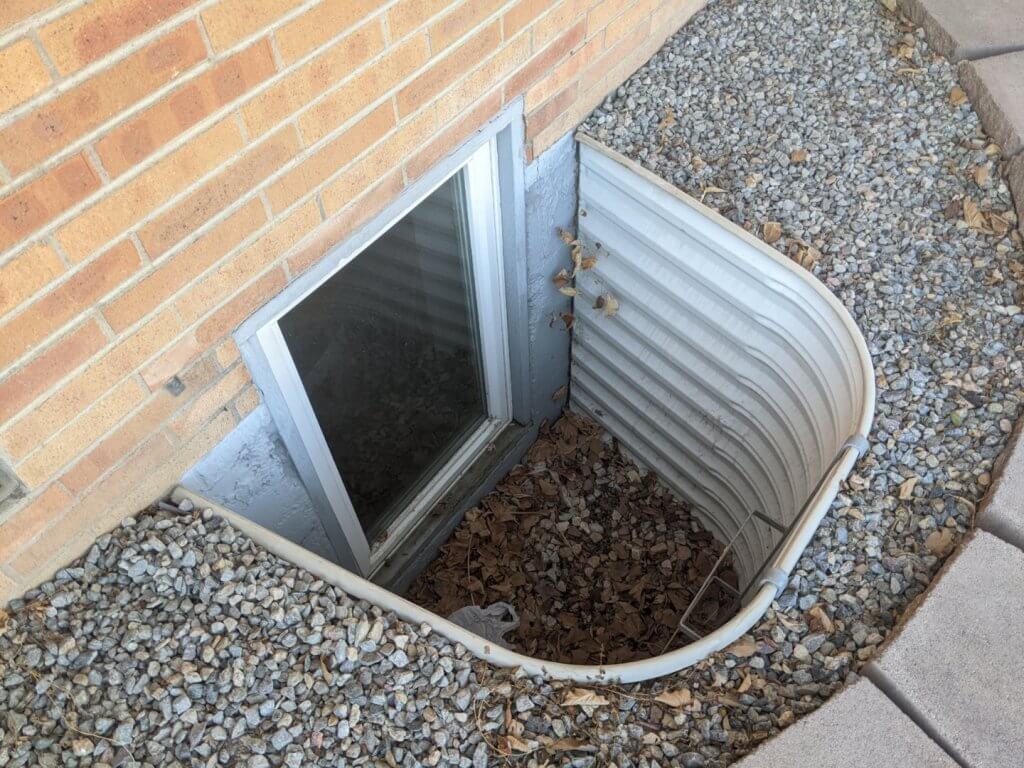 Picture of an egress window which is required for basement units