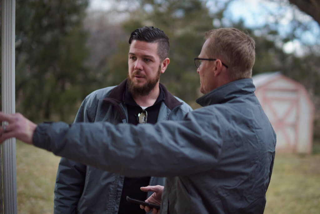 Is A Home Inspection Worth It? Our Inspectors Inspect the exterior of a home.