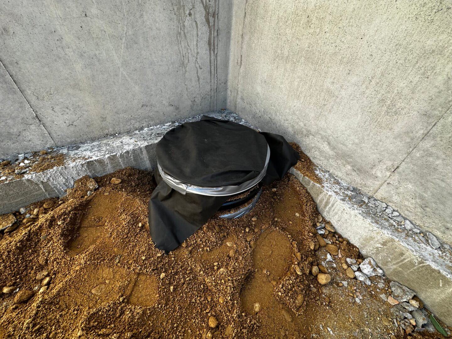 Sump pit before sump pump has been installed